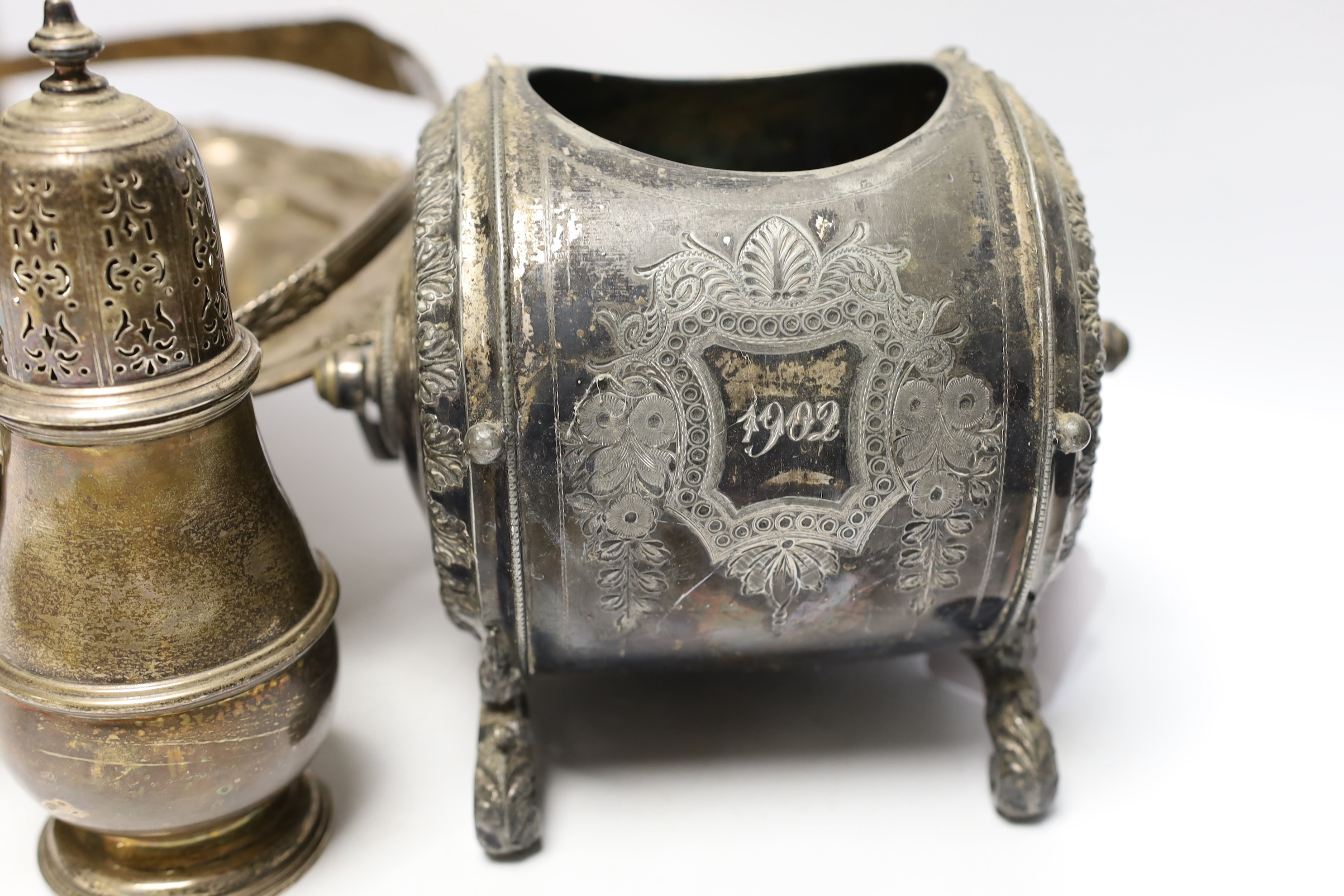 A George IV silver bread basket, London, 1827? (marks rubbed), diameter 31cm, together with a 1930's silver sugar caster, gross 40.2oz and a Brittania metal biscuit barrel.